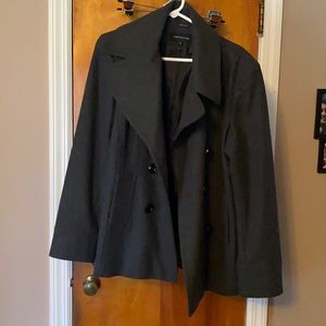 Like new!! Black wool pea coat.  Warm and classic.